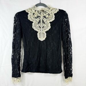 Elegant Black Lace Top with Cream Accents